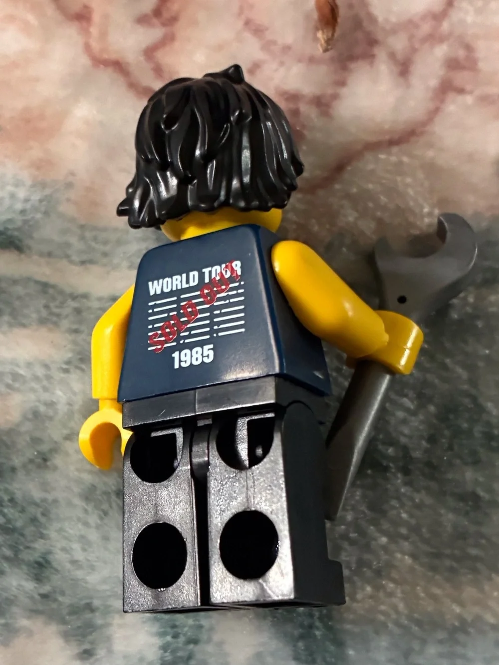 Lego Black-Haired Minifigure with Navy Printed Torso and Yellow Head